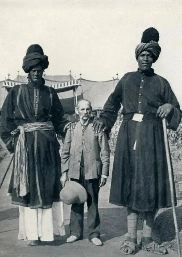 7 Remarkable Absolute Units Challenging Size Perceptions! 🦙✨ 13 Absolute Units of two Kashmiri guards (context in comments).