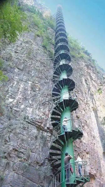 POV: You vs These 9 Absolute Tanks đ« 16 An enormous spiral staircase winding through a grand space