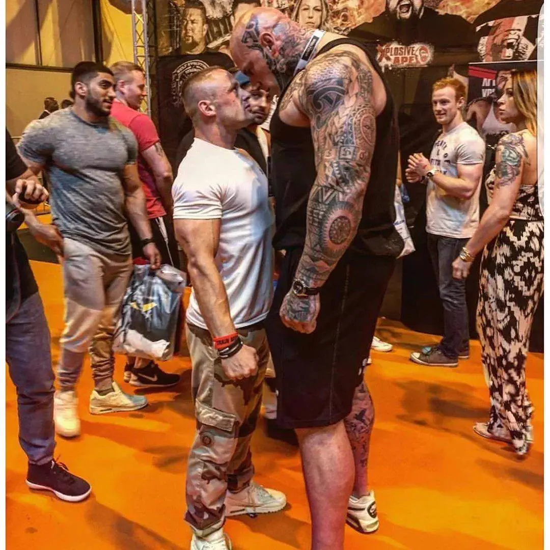 Wait Till You See These 11 Colossal Units đ« 14 Martyn Ford 6 foot 8 320 pounds absolute unit standing next to another person