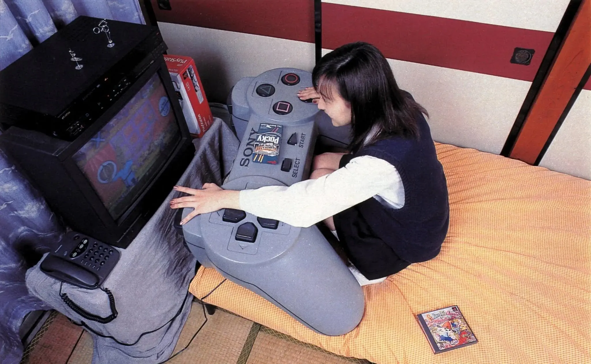 PUNCH: 7 Giants That Made Reality Question Everything 14 An oversized video game controller that dwarfs normal controllers