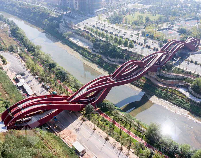 PUNCH: 7 Giants That Made Reality Question Everything 16 A huge pedestrian bridge stretching across an urban landscape